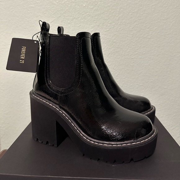 Forever 21 Shoes - Forever 21 Black boots (new with tags). US Women’s Size 5.5